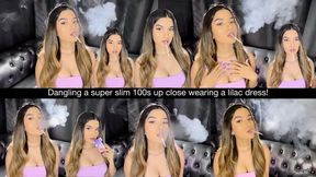 Dangling a super slim 100s up close wearing a lilac dress!