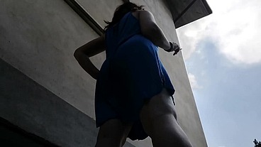 Upskirt pee in a outdoor public place