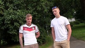Two kinky footy fans fuck around in a threesome