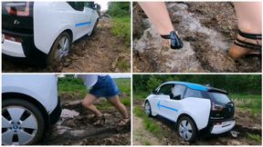 Exclusive BMW I3 car stuck in deep soft mud_muddy and wet high heels and pantyhose feet
