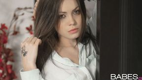 Impressive brunette Lou is enjoying showing off her naked pussy