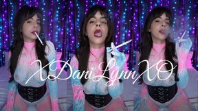 Smoking Wearing Blue And Pink Fishnet Bodysuit