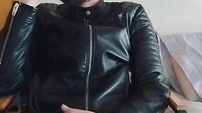 Leather-clad men smoking and masturbating