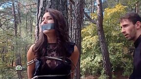 Russian Woman Tape Gagged And Tied To A Tree