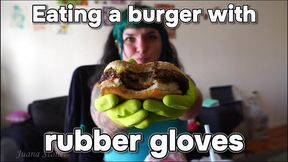 Eating a burger with rubber gloves