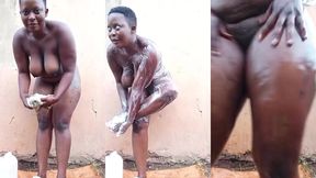 busty african babe with a nice body outdoor shower