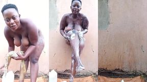 busty african babe with a nice body outdoor shower