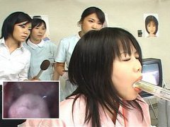 Japan milf doctor uses dildo with camera for oral exam
