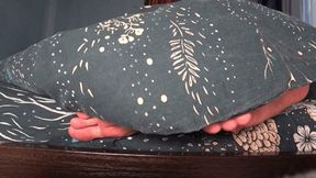 male and female feet under the blanket c
