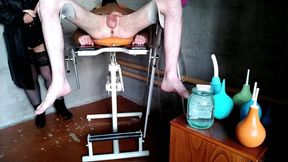 Mistress washes slave_s ass with two different enemas