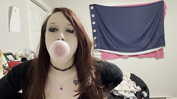 sweet step daughter blows bubbles for the camera