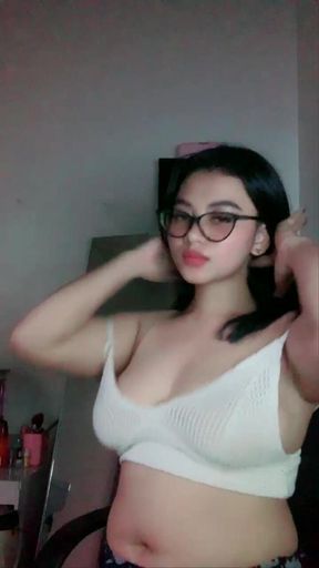 Olyvia Stroking Breasts to Get Horny