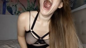 Big Yawning Close Up in Fishnets Miniskirt