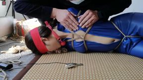 Sinful Oriental in Blue Latex, Gagged and Dildoed