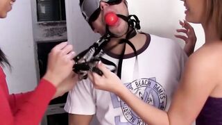 Two horny teens restrain big cocked dude and fuck him