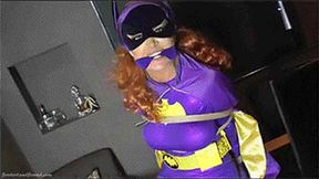 Daisy May in: The Remote-Controlled Abomination Scheme & BatGirl is Helpless in the Clutches of The Smiler! (WMV)