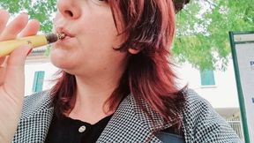 Sexy chubby readhead smoke in a garden avi