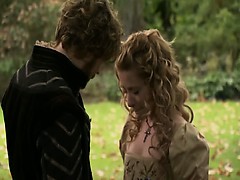 Krystin Pellerin making out with a guy against a tree in