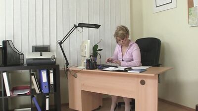 Mature blonde secretary is being fucked by her young boss