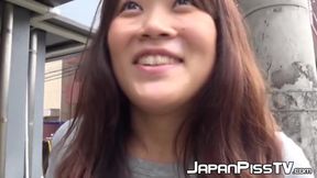 This shy girl needs to pee badly and brings a friend to record her while doing it outdoor