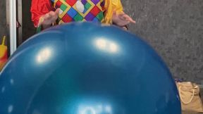 Clown-girl-tiding-on-beachball-hopper-ball-and-rody