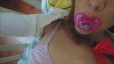 b. girl loves her tasty pacifier
