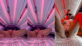 tattooed girl masturbate in the solarium