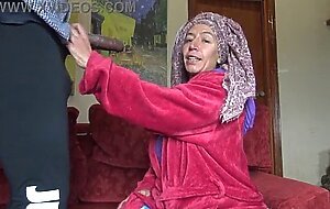 A turkish house maid is disturbed when she sees his big black cock