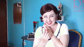 Red lipstick making out pose by Regina Noir.