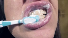 Brushing my teeth thoroughly and playing with mouth and lips