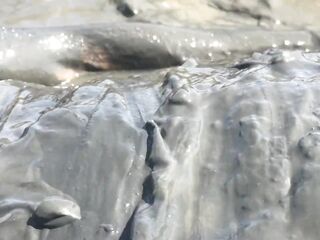 Hawt Angel playing in the River Mud. Slimy joy (Fully Dressed)