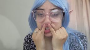 anime cosplayer elf girl ahageo making faces with pacifier and sucking her finger