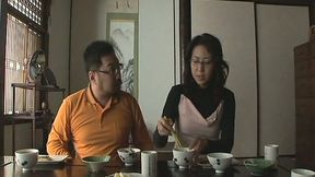 Two salacious Asian gals are making love after dinner