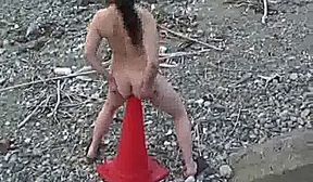 Giant road cone fuck at a public beach