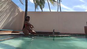 relaxed in the pool with mature brunette