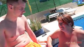 Poolside Prowess: Mature Cougar JoJo Devours Innocent Lad, Slick Flesh on Display