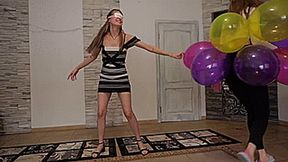 Game pop the balloons blindfolded