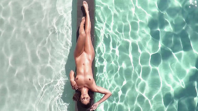 Carolina and Penelope licking each others pussy by the pool