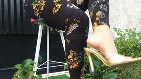 High heels dangle from the feet of a cross-legged goddess (3)