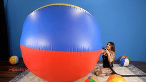 Cinthya Inflates Large Beach Balls by Machine HD (1920x1080)