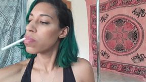Smoking and sucking a dildo