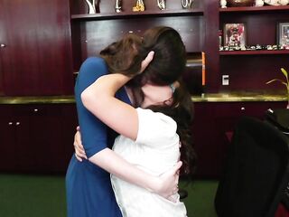 Slutty lesbo finger screws her girlfriend's pussy in an office
