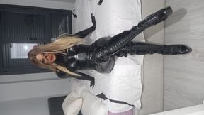 Dominatrix rubber Doll subdues slave girl