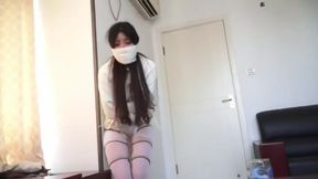 Panic in Silk: Japanese Brunette Thrashes in Straitjacket and Stockings