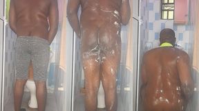 african giant fingering his tight anus while bathing