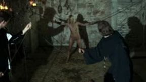 Rominas Martyrium – A witch's cunt gets wet when her labia are hit by a heavy sodden potato sack as a pleasurable game for her punishers