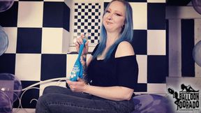 Emily is blowing a soap blue 24 Inch ballon untill it pops 4K UHD Version