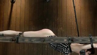Lesbo stapped to ladder and spanked