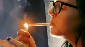Beautiful Brunette Closeup Smoking Cigarette