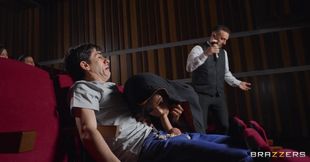 Curly-haired ebony with big tits gets fucked in the cinema - public interracial